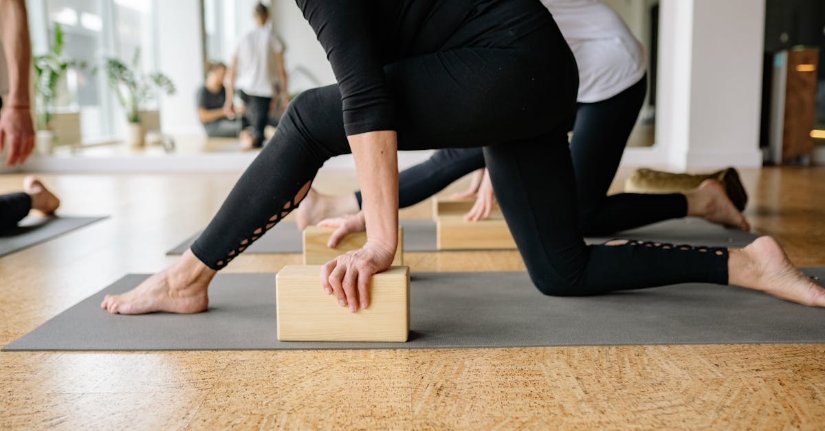 Adult practicing supported mobility work and controlled movement.